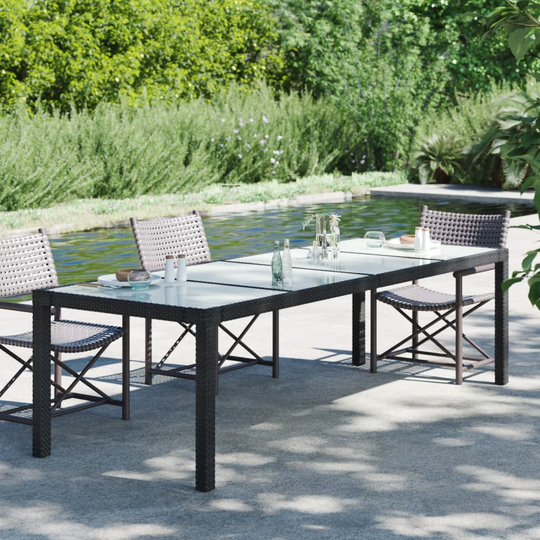 vidaXL Puutarhapöytä 250x100x75cm karkaistu lasi ja polyrottinki musta